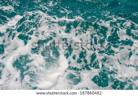 Water splash from back of boat