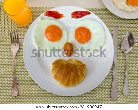 Happy Face Frying Eggs breakfast.