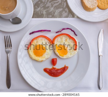 Happy Face Frying Eggs breakfast.
