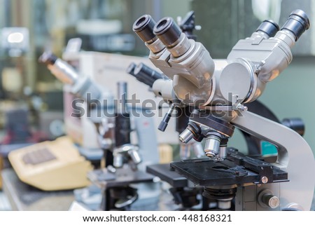 science, chemistry, biology, close up of Vintage microscope for test sample making research in clinical laboratory.