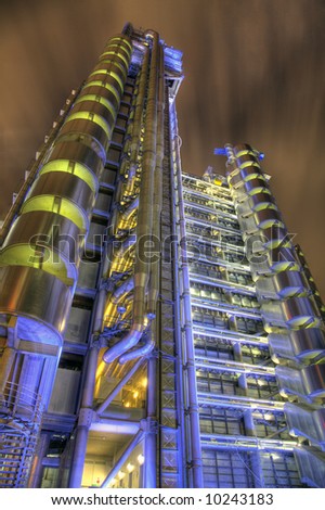 View of the Lloyds Building at One Lime Street in the City of London. Detailed night-time HDR image.