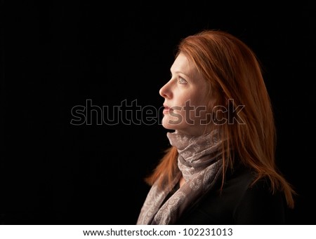 Beautiful woman profile black background