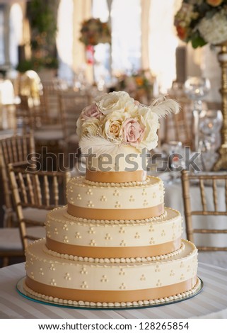 Wedding Cake With Roses At Luxury Reception