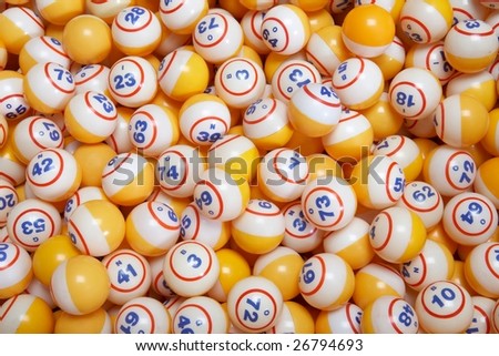 Background of many yellow lottery bingo balls