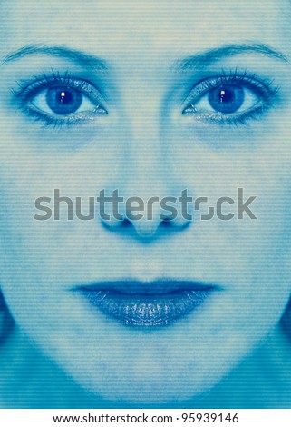 High-tech woman face technology background with scan