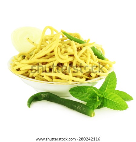 indian food ganthia sev or noodles snack with chili onion in pure white background