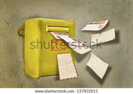 Letters flying into a old mailbox