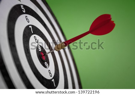 Darts arrow in the target center