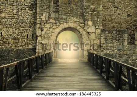 Door to Heaven. Light at end of the tunnel. Hope metaphor.