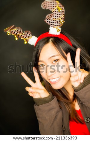 christmas winter happiness happy with red hat holding deer hat