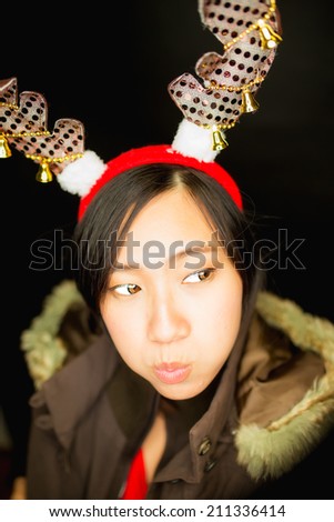 christmas winter happiness happy with red hat holding deer hat