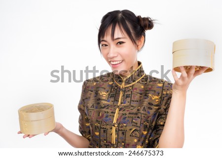 asian woman with dim sum basket ready to eat