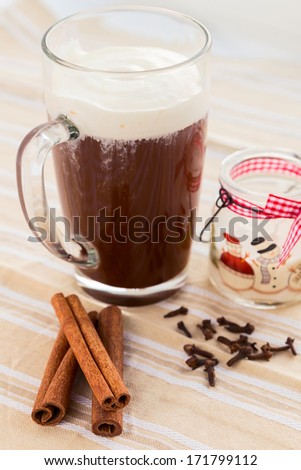 Hot chocolate with cinnamon stick and clove