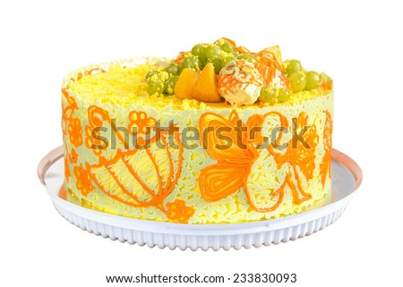 Bright cakes decorated with orange and yellow chocolate border. Isolated on white