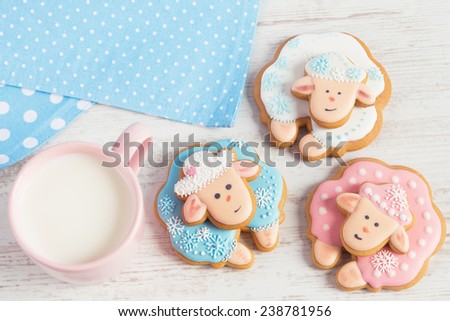 Winter gingerbread sheep with cup of milk. Top view
