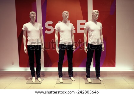 window with dressed man mannequins