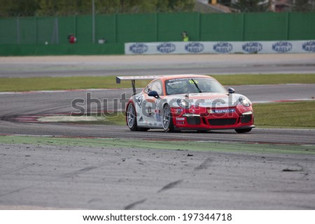 MISANO ADRIATICO, Rimini, ITALY - May 10:  A Porsche 911 GT3 Cup of Ghinzani Arco Motorsport team, driven By CASSARÃ?Â?? Marco (ITA), the ,Porsche Carrera Cup car racing on May 10, 2014