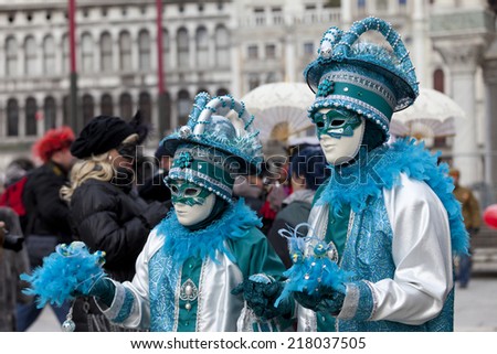 Venice, Italy - February 11, 2012: Two wonderful participant of the annual carnival. Carnival is one of the oldest traditional feasts of Venice.