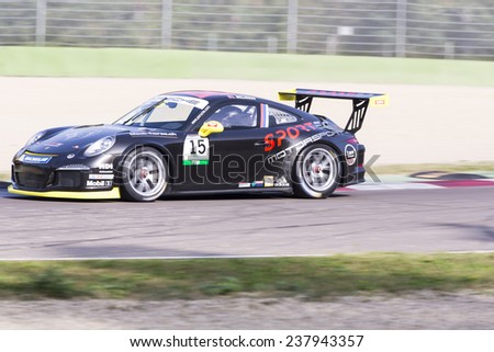 Imola, Italy - October 11, 2014: A Porsche 911 Gt3 Cup of Sportec Motorsport team, driven By Melnikov Ilya (Rus),  the Porsche Carrera Cup Italia car racing on October 11, 2014 in Imola, Italy.