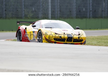 Imola, Italy - May 16, 2015: Ferrari F458 Italia of JMW MOTORSPORT Team, driven by George Richardson  - Robert Smith - Samuel Tordoff in action during the European Le Mans Series - 4 Hours of Imola