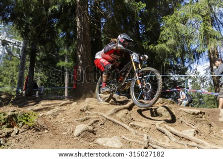 Val Di Sole, Italy - 22 August 2015: Madison Saracen Factory Team,  Rider Dale Sam in action during the mens elite Downhill final World Cup at the Uci Mountain Bike in Val di Sole, Trento, Italy