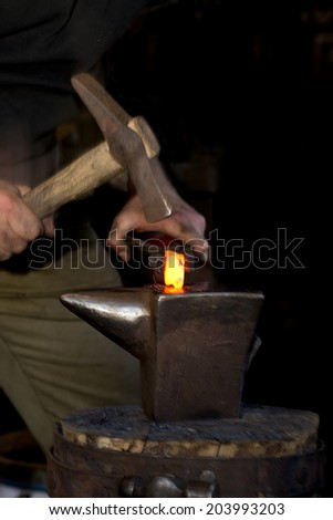 Ancient forging hammer and anvil