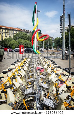 MOILAN - JUNE 6 2014: bike sharing station in Milan. The percentage of people that hire a bike to go into the city is increasing year by year. The hiring stations are diffused in the city.