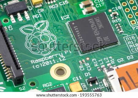 ARAD, ROMANIA - May 18, 2014: Close-up of a Raspberry Pi Model-B Rev2. The Raspberry Pi is a credit-card-sized single-board computer developed in the UK by the Raspberry Pi Foundation. Studio shot.