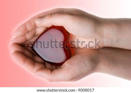 Heart symbol in woman\'s hands 3
