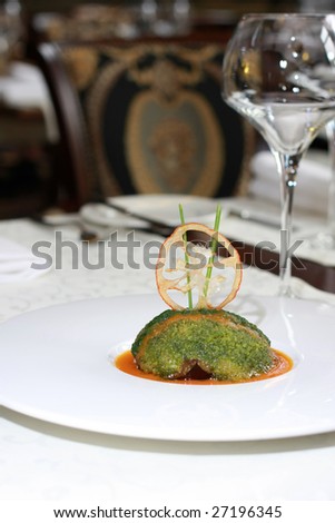 Vegetarian creative food in luxurious restaurant - served table