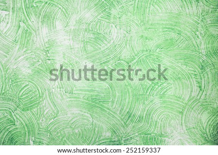 Decorative green plaster texture on the wall - art brush stroke background