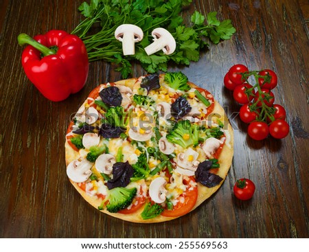 Delicious vegetarian pizza with mushrooms, corns and broccoli
