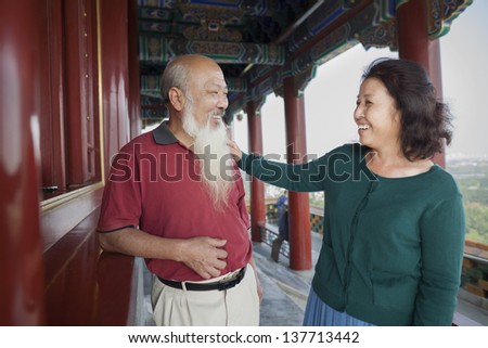 Old Couple Talking In Jing Shan Park