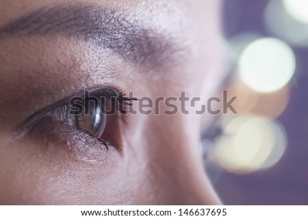 Close up of woman\'s eye, side view