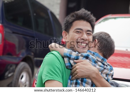 Father and Son Hugging