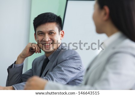 Business People Talking in a Conference Room