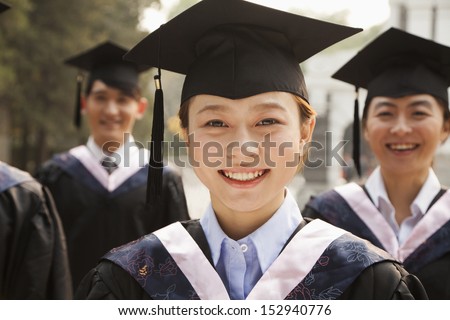 Young Graduates in Cap and Gown