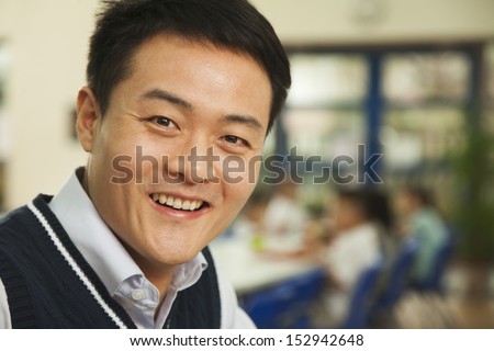 Teacher portrait at lunch in school cafeteria