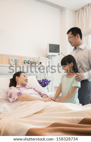 Family visiting the mother in the hospital