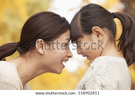 Mother and daughter face to face