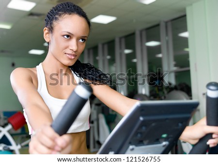 pretty women on the track  at the fitness club