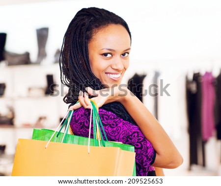 Beautiful  latin american women with packages shopping