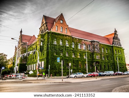 WROCLAW. POLAND - AUGUST, 23: Historic building covered with green ivy. National Museum in Wroclaw, Poland, August, 23, 2014