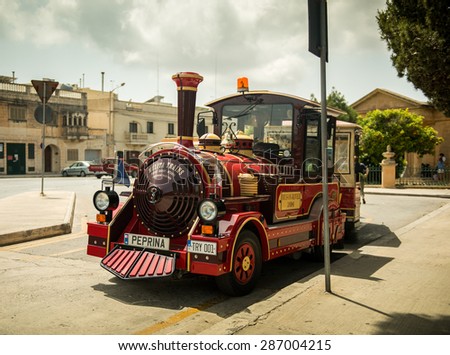 MEDINA, MALTA - MAY 26: Excursion train in the historical part of the city. Medina, Malta on May, 26  2015. Medina - this is the first capital of Malta