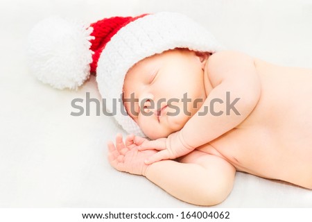 Adorable Sleeping Newborn Baby Wearing Santa Claus Hat, Christmas, New Year