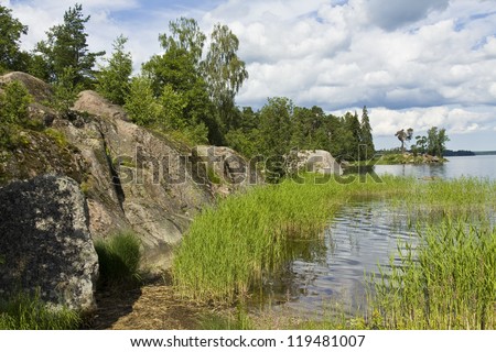 Summer landscape recorded in park Monrepo near town Vyborg in Russia on bank of Gulf of Finland.