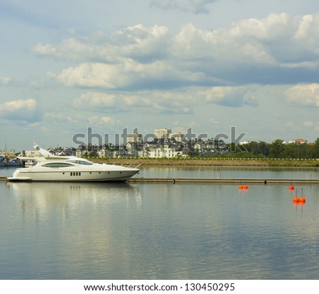 Moscow, yachts on water and quay of Khimki water storage reservior.