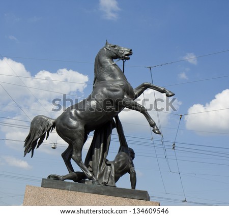 ST. PETERSBURG, RUSSIA - JULY 12: sculpture of horse on Anichkov bridge, July 12, 2012, in town St. Petersburg, Russia, has been errected in 1841, sculpture Klodt.