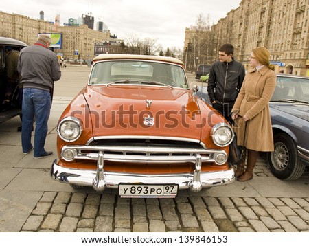 MOSCOW - APRIL 21: retro car Dodge on rally of classical cars on Poklonnaya hill,  April 21, 2013, in town Moscow, Russia, unidentified people looking at rally.