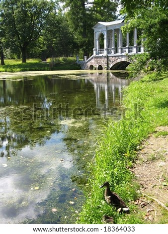 Bridge with collonade in park belongs to palace of queen Ekaterina II Great in Tsarskoye selo, surroundings of St.Petersburg, Russia